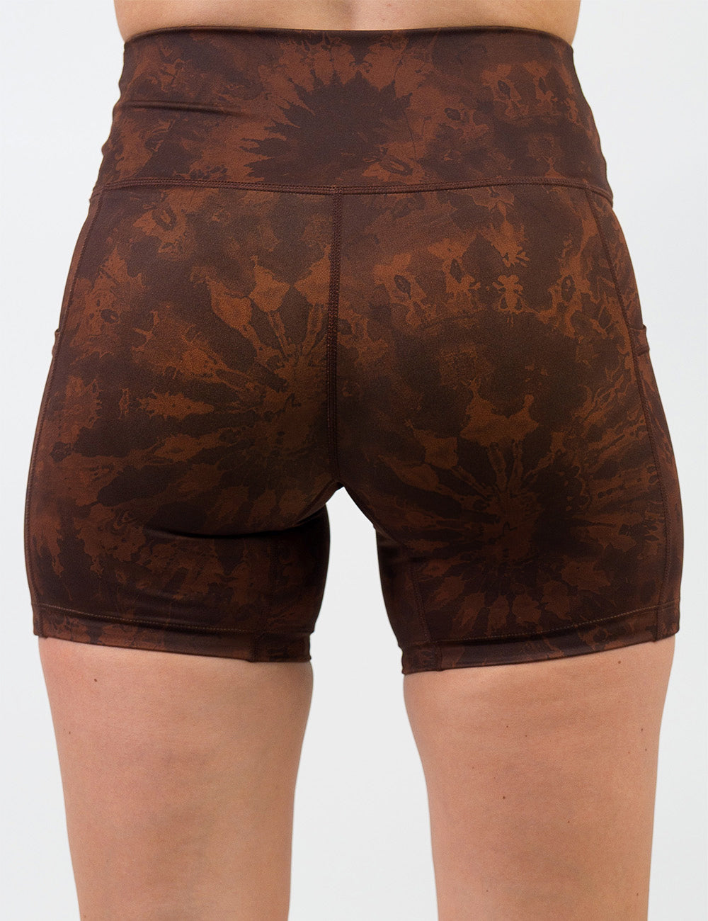 back of the brown tie dye 5 inch shorts against a white background