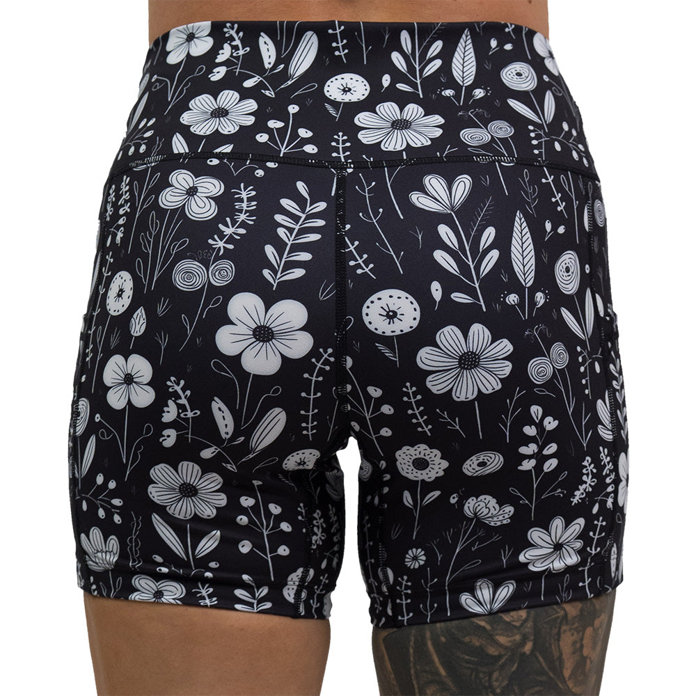 back of 5 inch black and white floral shorts