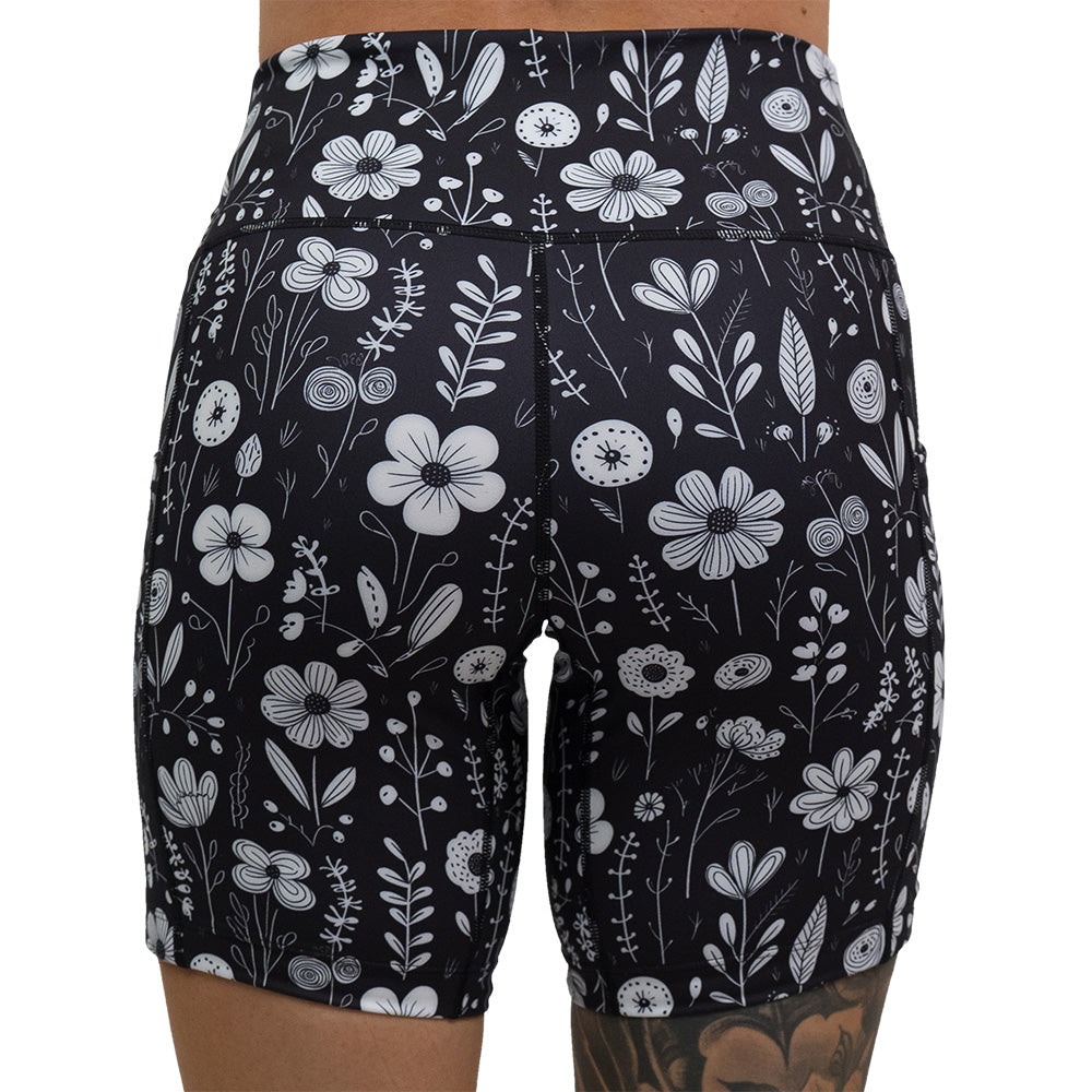 back of the black and white floral 7 inch shorts