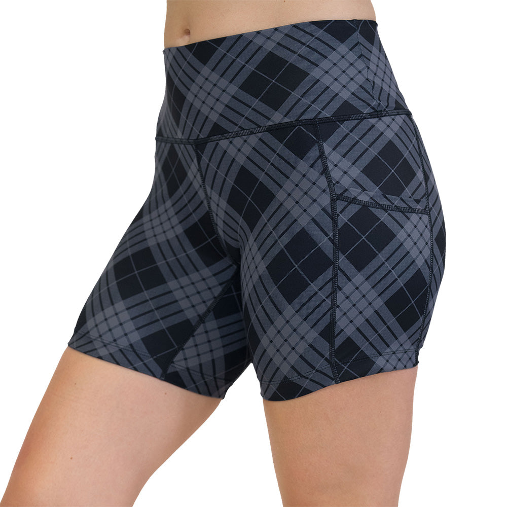 Plaid patterned shorts on a white background