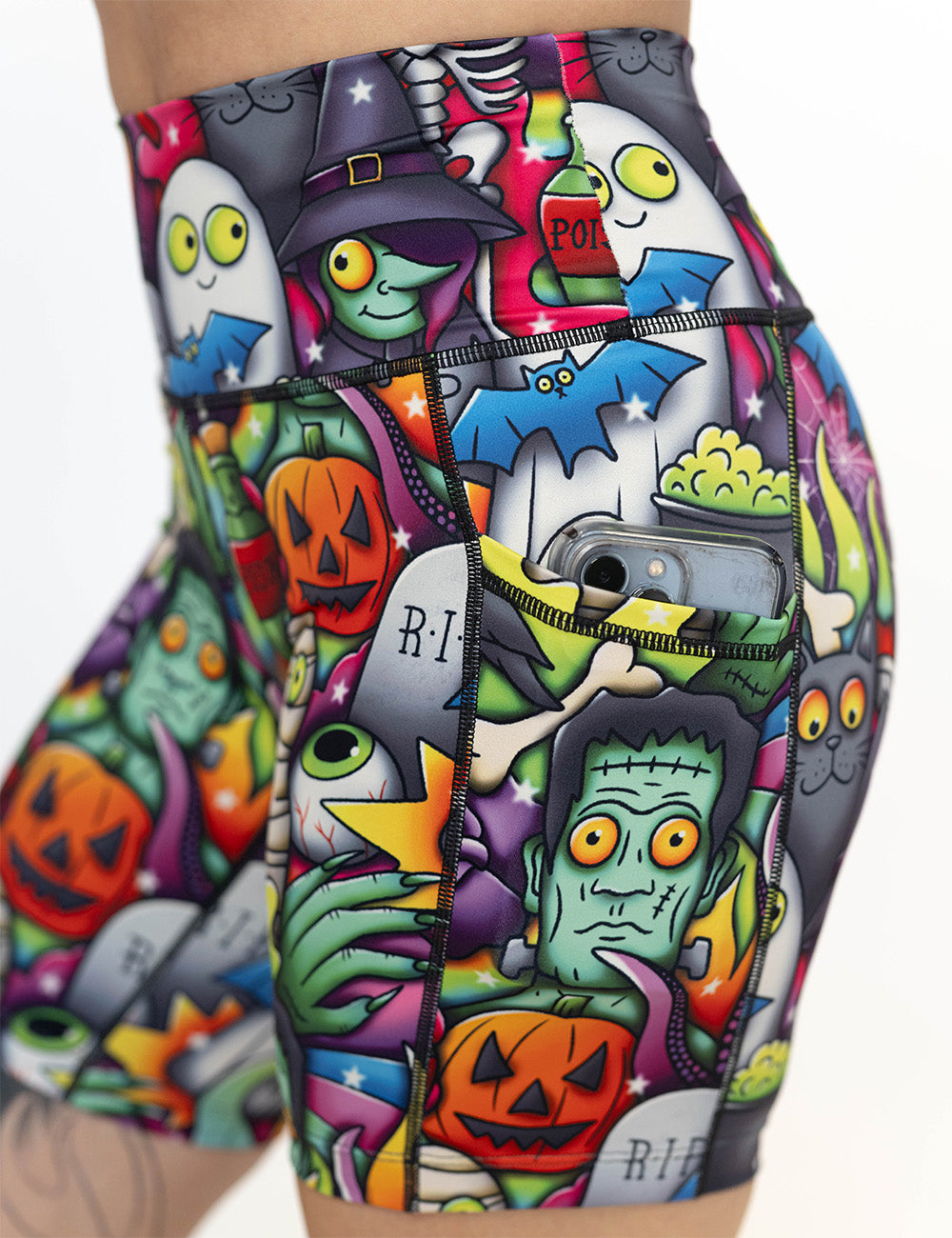 close up of the 7 inch Halloween characters shorts with a phone in its pocket
