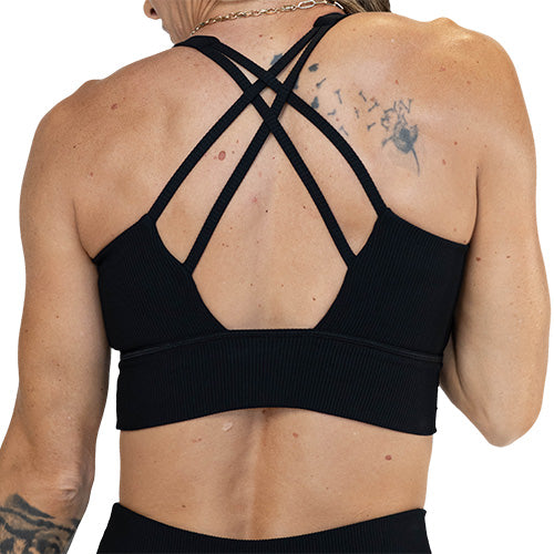 back of black ribbed design sports bra