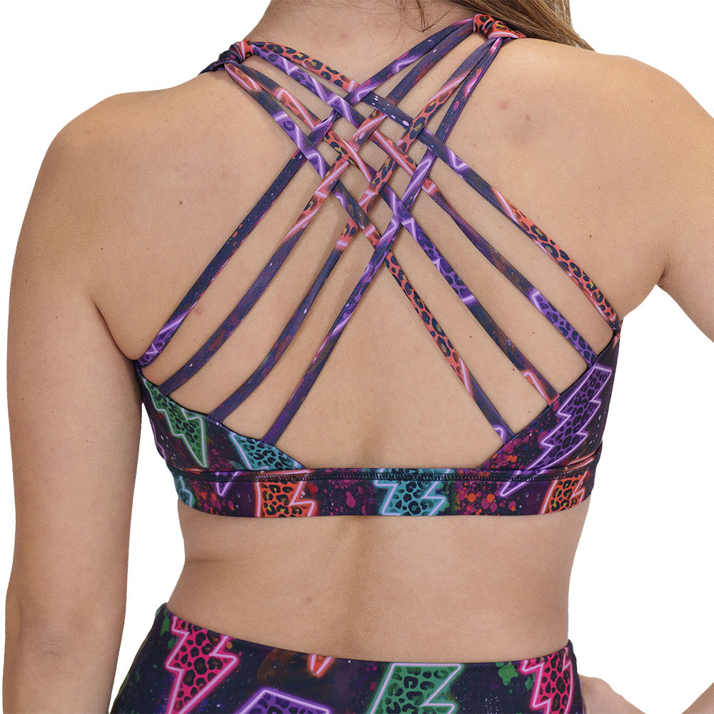 back of the neon thunderbolts patterned sports bra