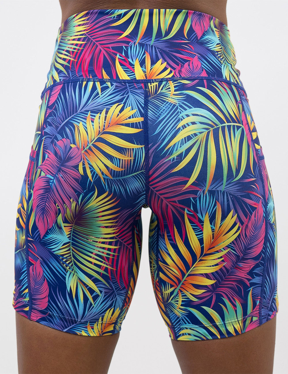 back of the 7 inch vibrant tropical leaves shorts against a white background