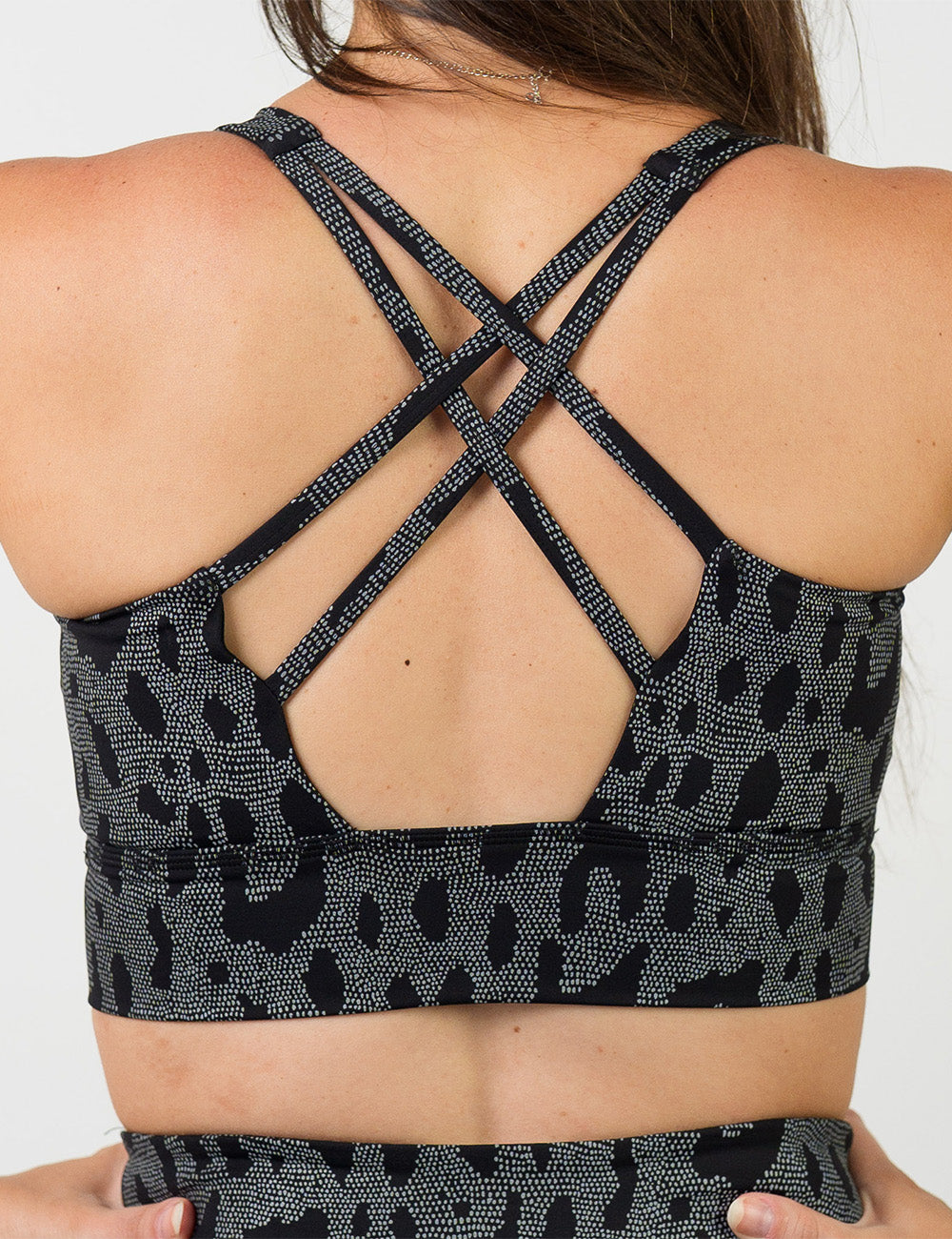 back of the dark spots surrounded by a reflective background bra