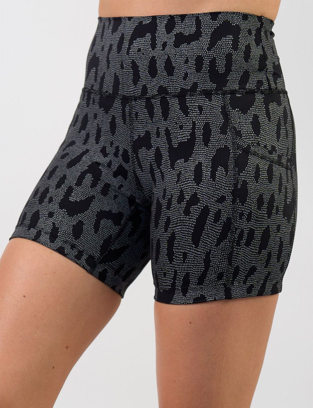 front of the dark spots surrounded by a reflective background 5 inch shorts