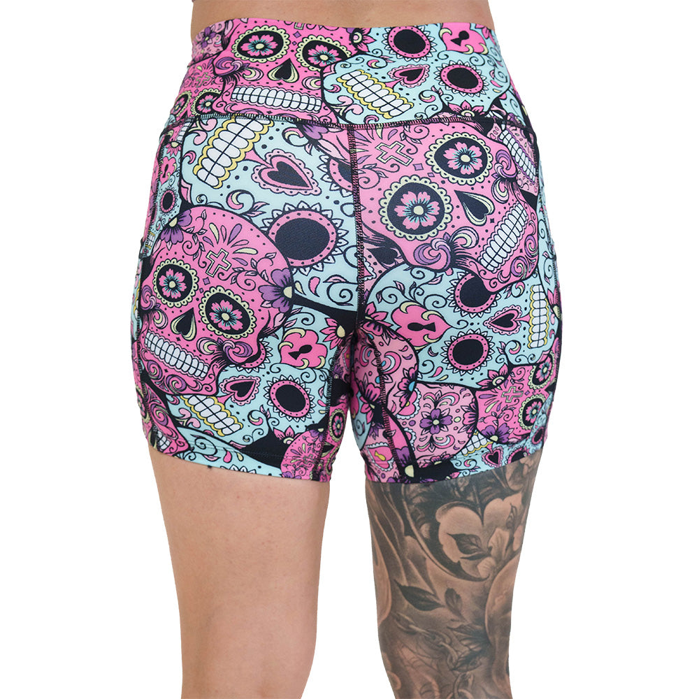 back of the pink, blue & purple skull print shorts