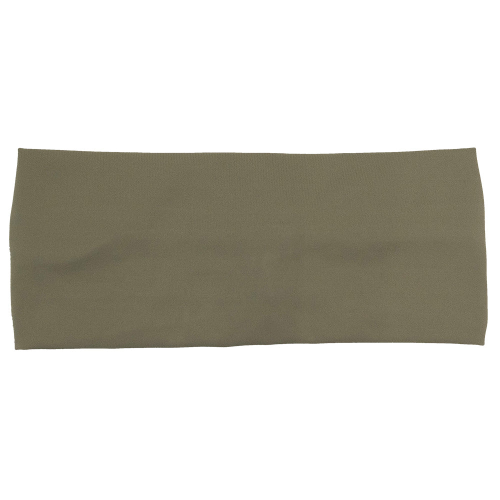 front of the omni green tee headband against a white background