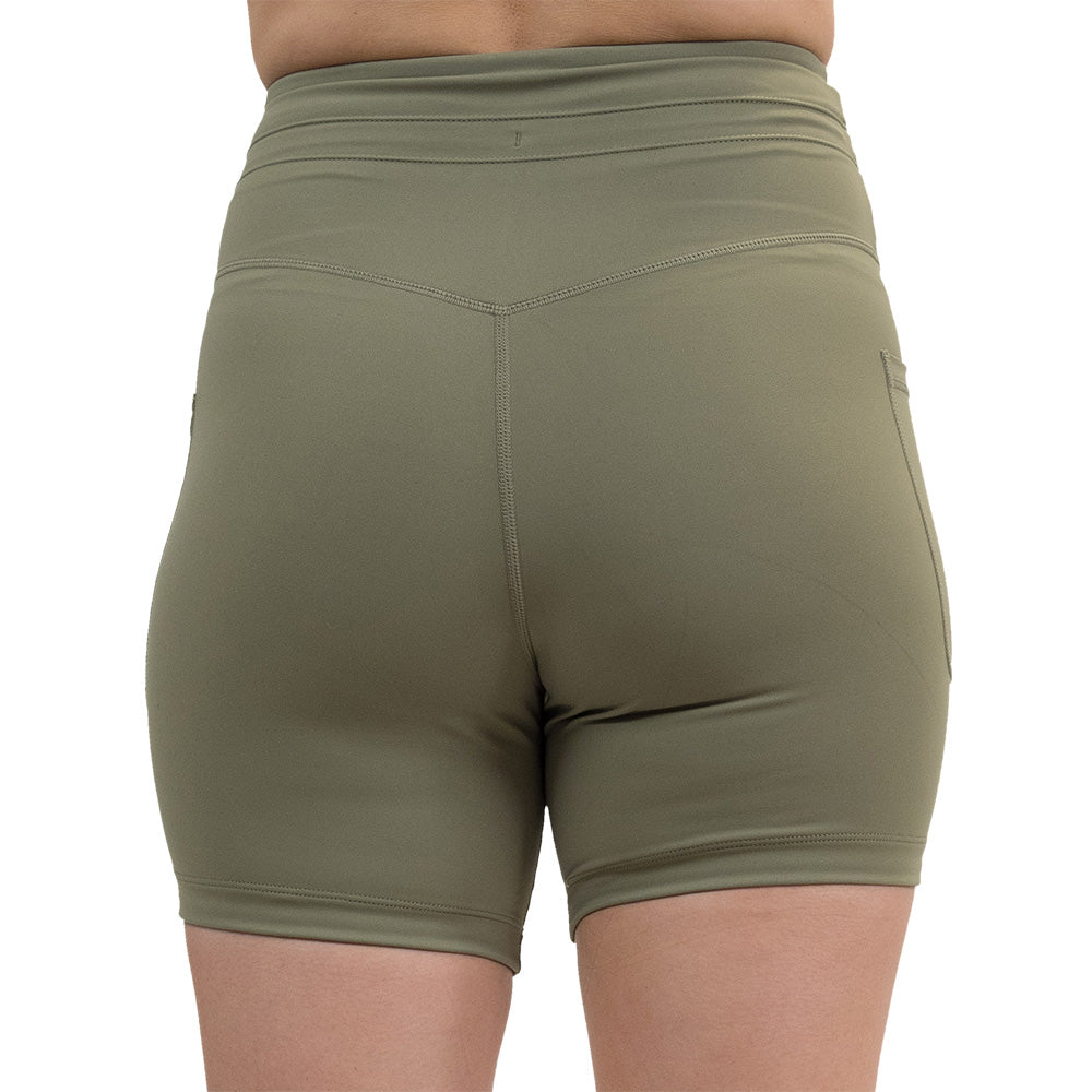 back of the omni green tea 5 inch shorts against a white background