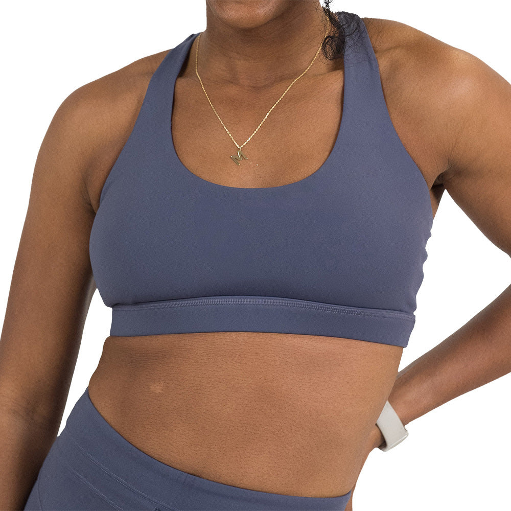 front of the omni twilight purple butterfly back bra against a white background