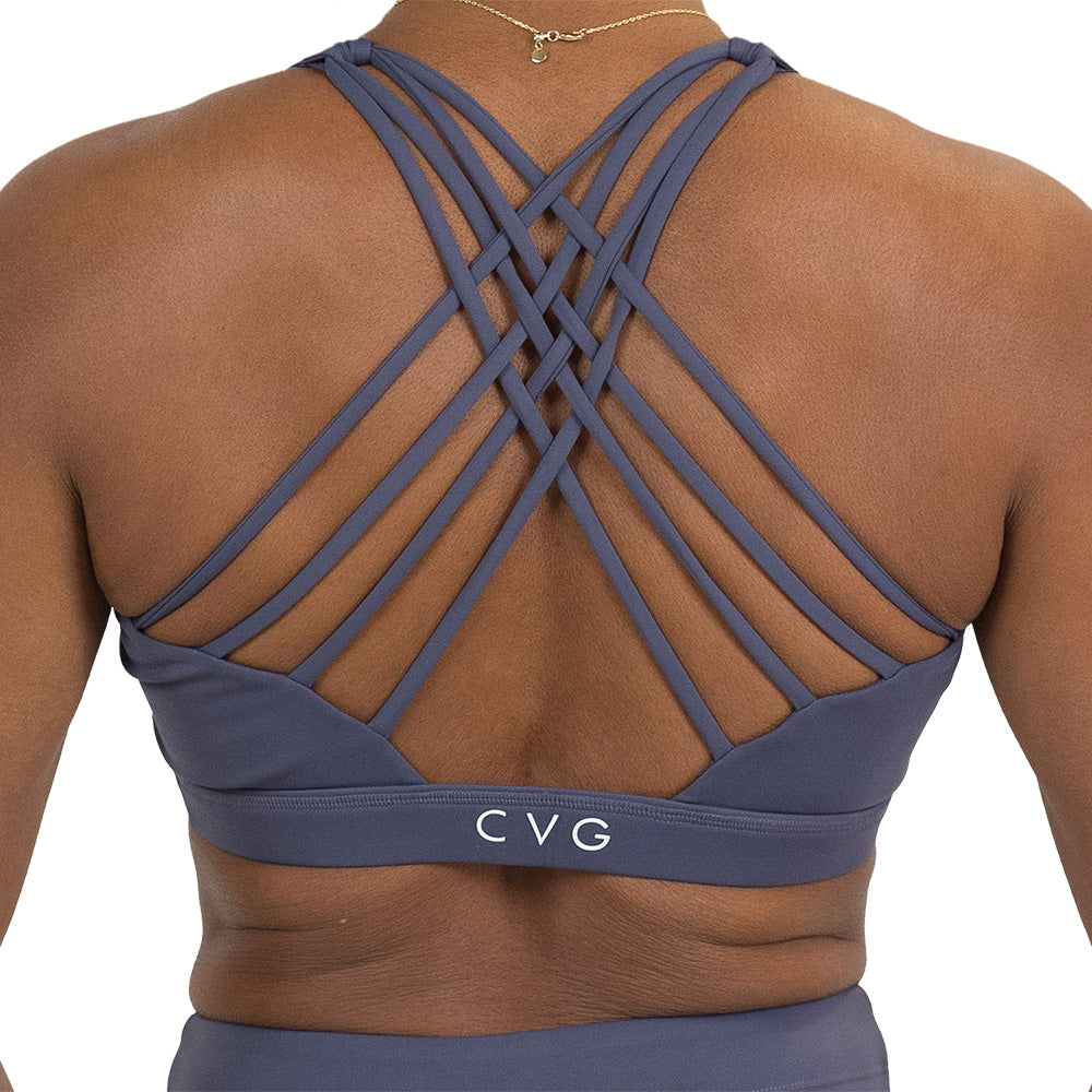 back of the omni twilight purple butterfly back bra against a white background