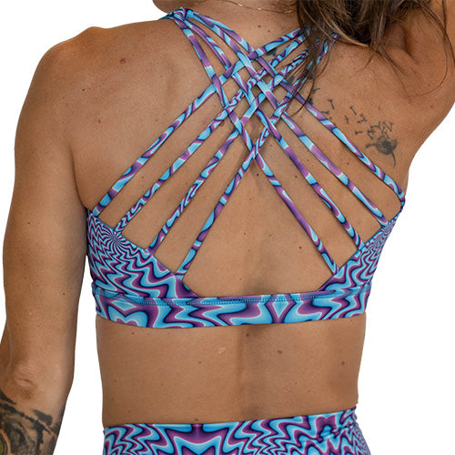 back of blue and purple mind games sports bra