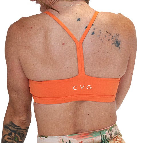 back of the solid orange sports bra