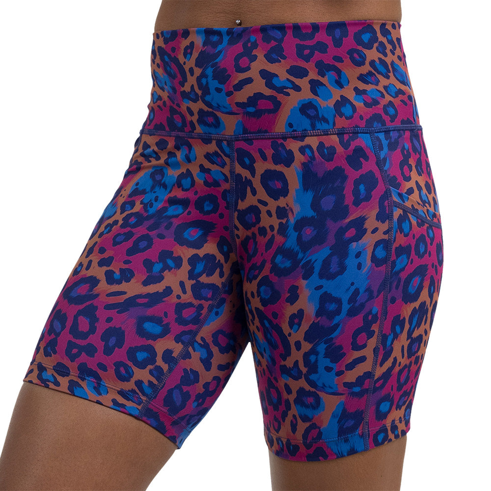 cheetah print against a yellow, blue, and purple background pattern 7 inch shorts facing the front against a white background