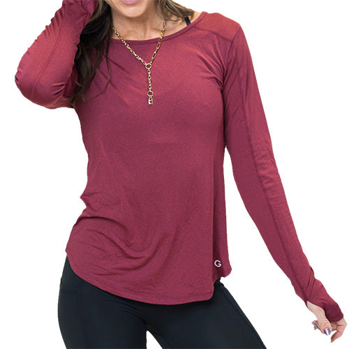 model wearing a maroon long sleeve shirt