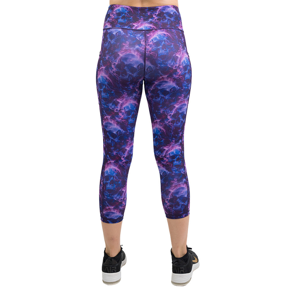 back of the purple and blue skull and flames patterned leggings