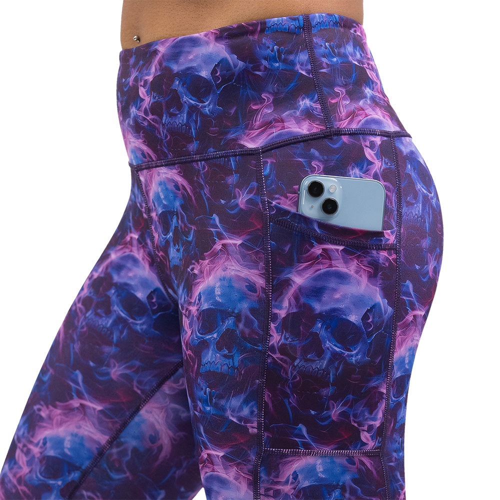 purple and blue skull and flames patterned leggings