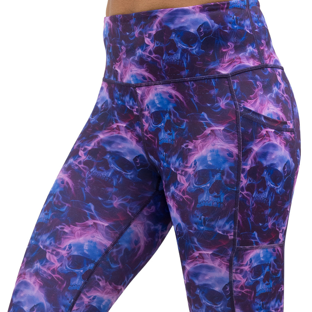 purple and blue skull and flames patterned leggings