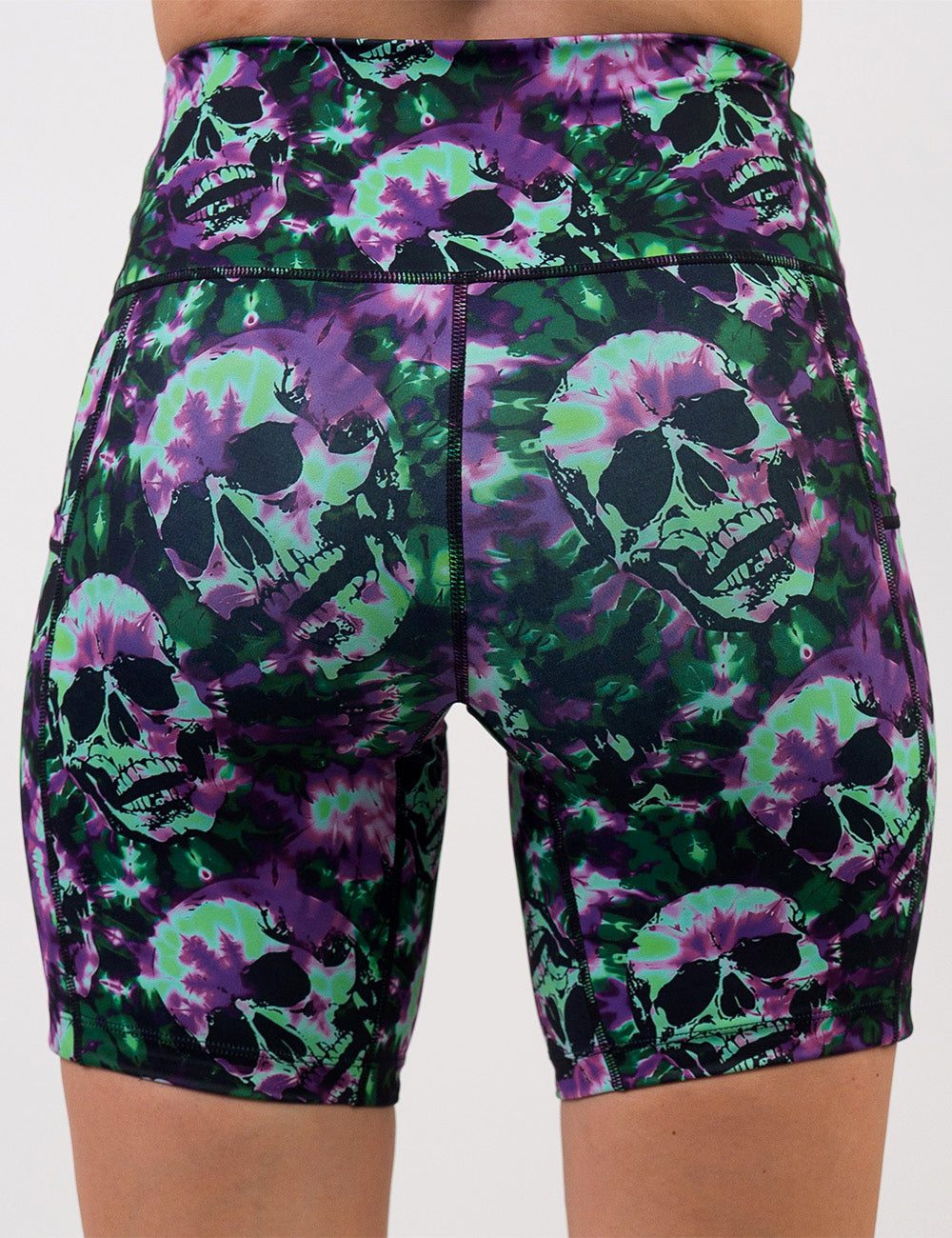 back of the purple and green tie dye skulls 7 inch shorts against a white background