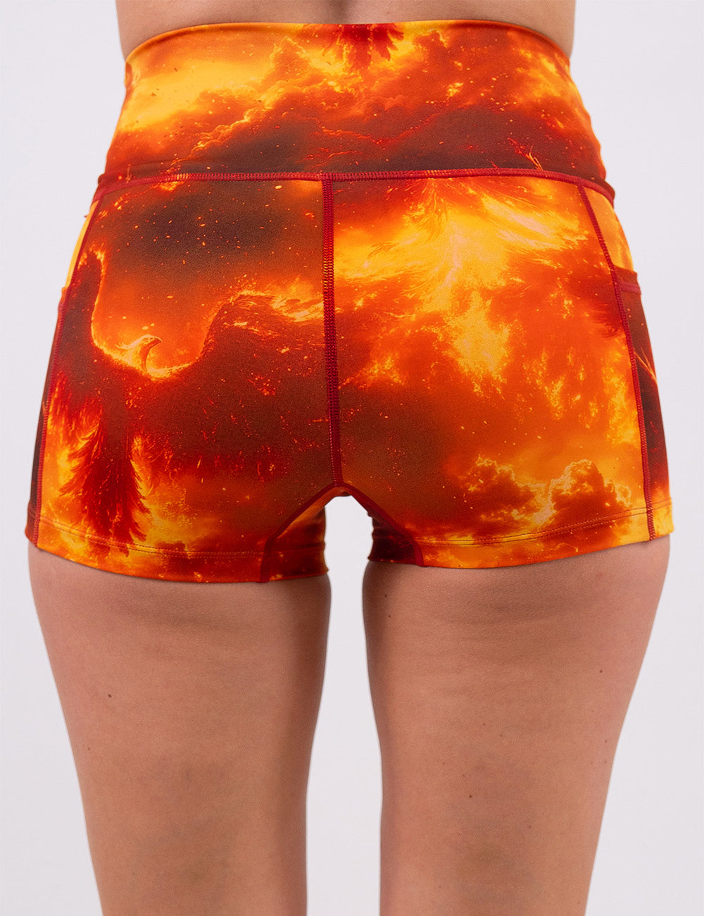 back of the phoenix surrounded by fire 2.5 inch shorts against a white background