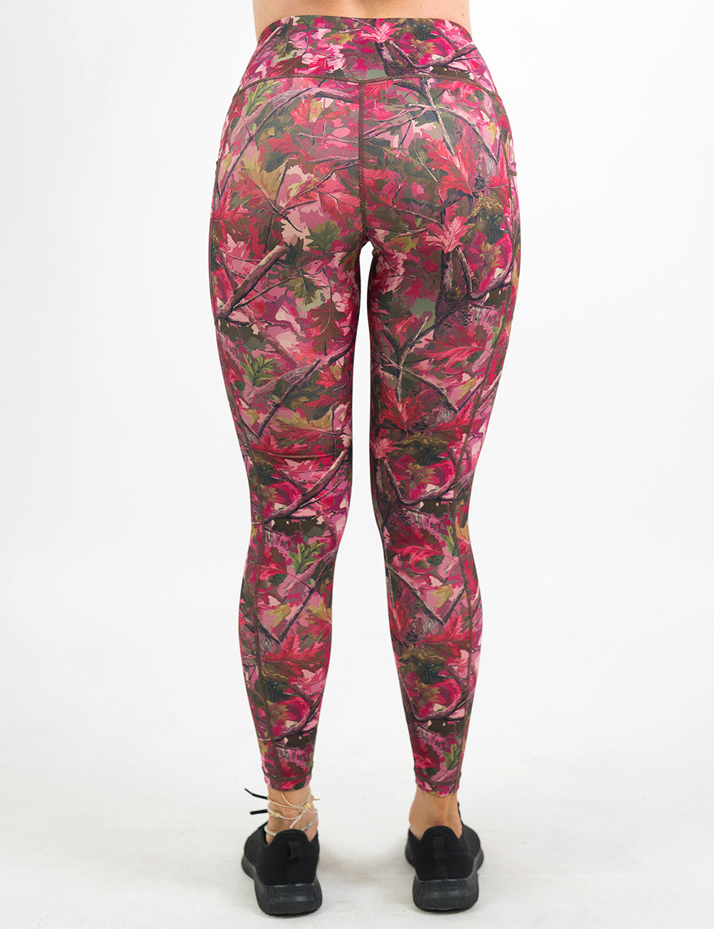 back of the full length pink forest camo leggings against a white background