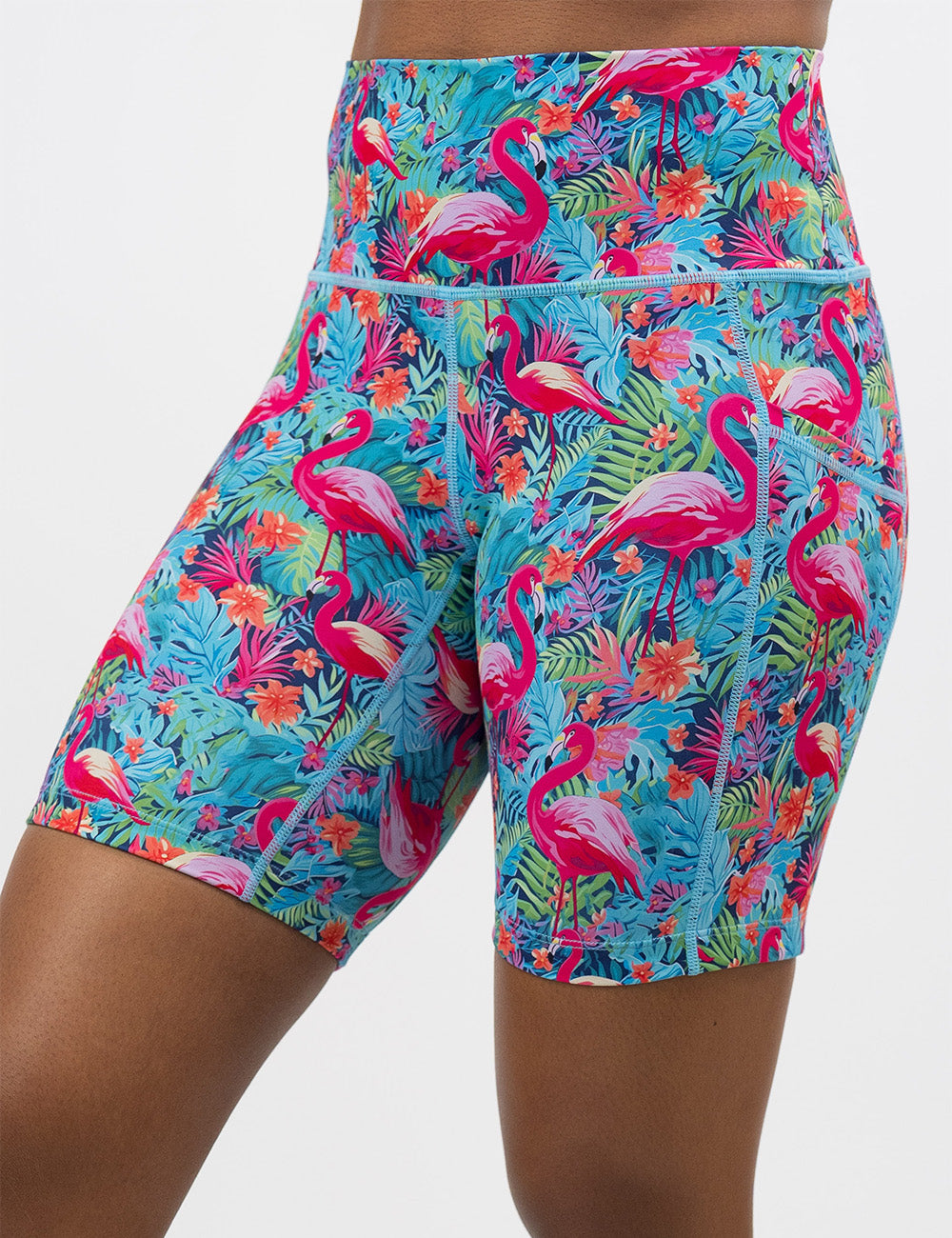 the 7 inch colorful flamingo print shorts facing the front against a white background