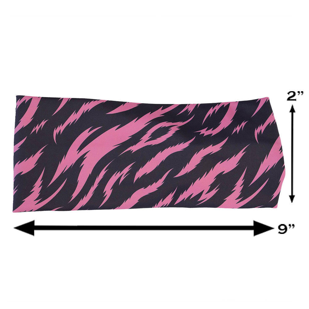 headband with pink and black zebra pattern measured at 2 by 9 inches