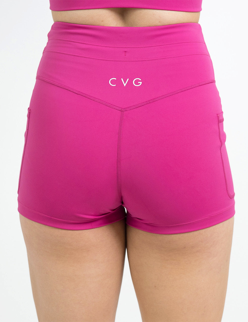 back of the 2.5 inch pink omni style shorts against a white background
