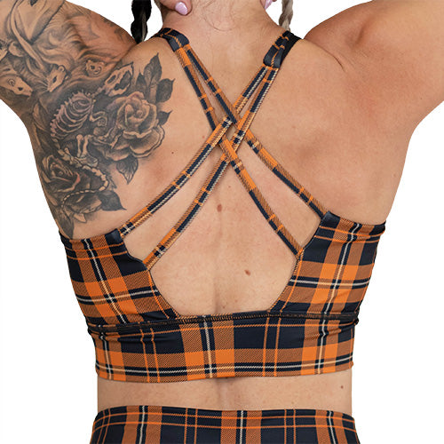 back of orange plaid sports bra