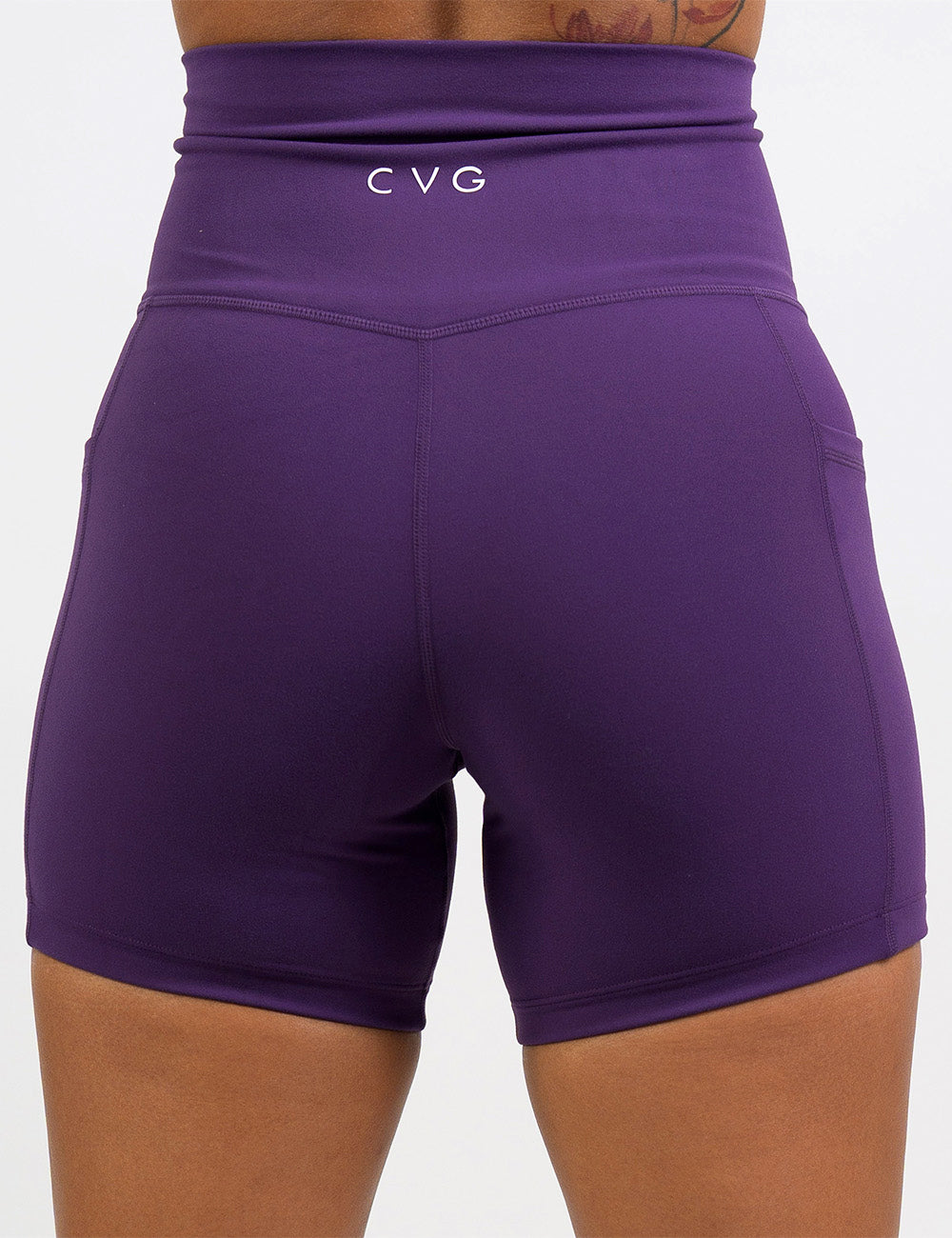 back of the 5 inch solid purple shorts against a white background