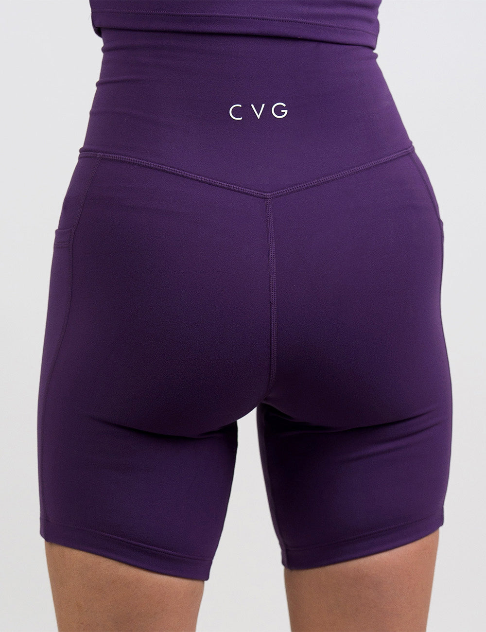 back of the 7 inch solid purple shorts against a white background