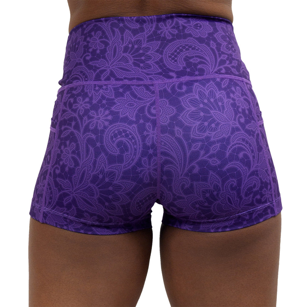 back of the purple flower artwork 2.5 inch shorts against a white background