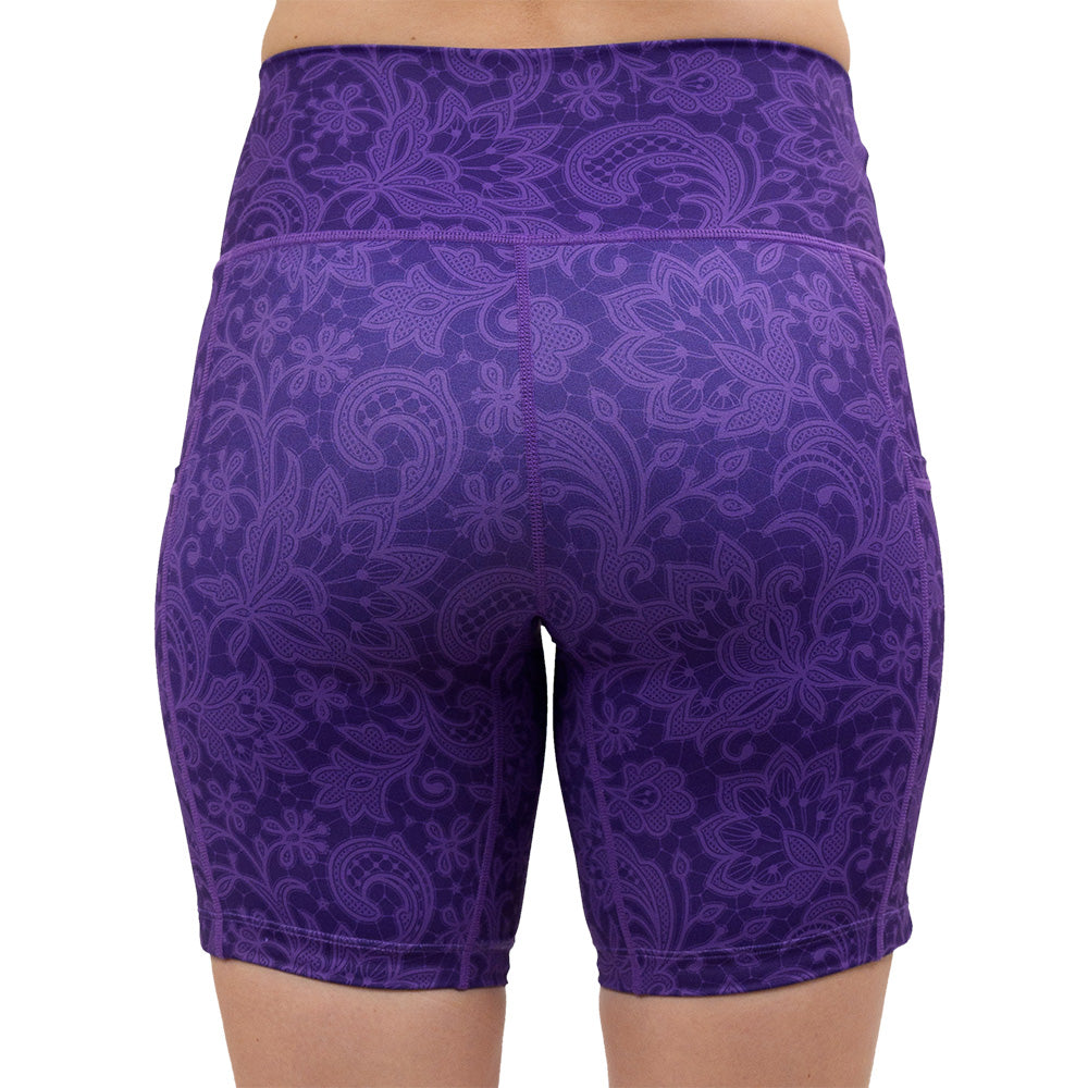 back of the purple flower artwork 7 inch shorts against a white background