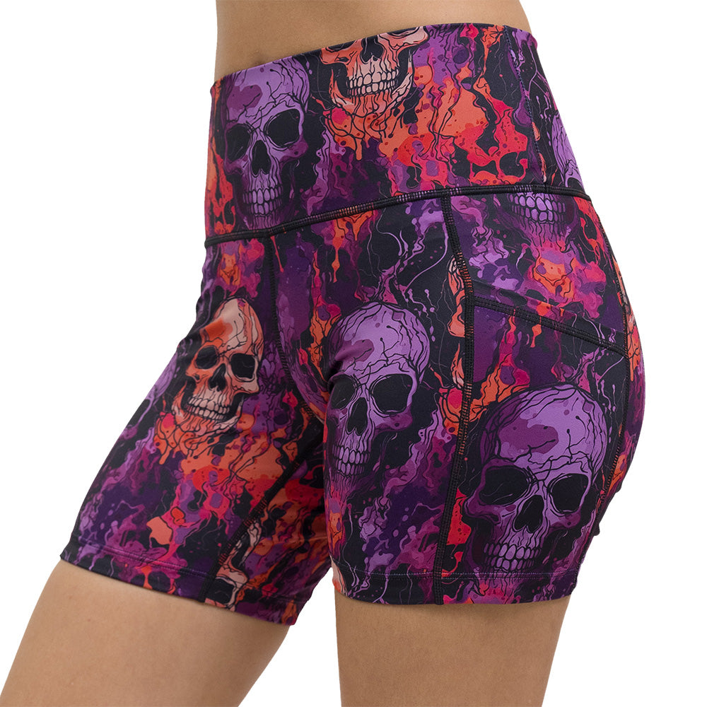 purple and orange skull patterned shorts