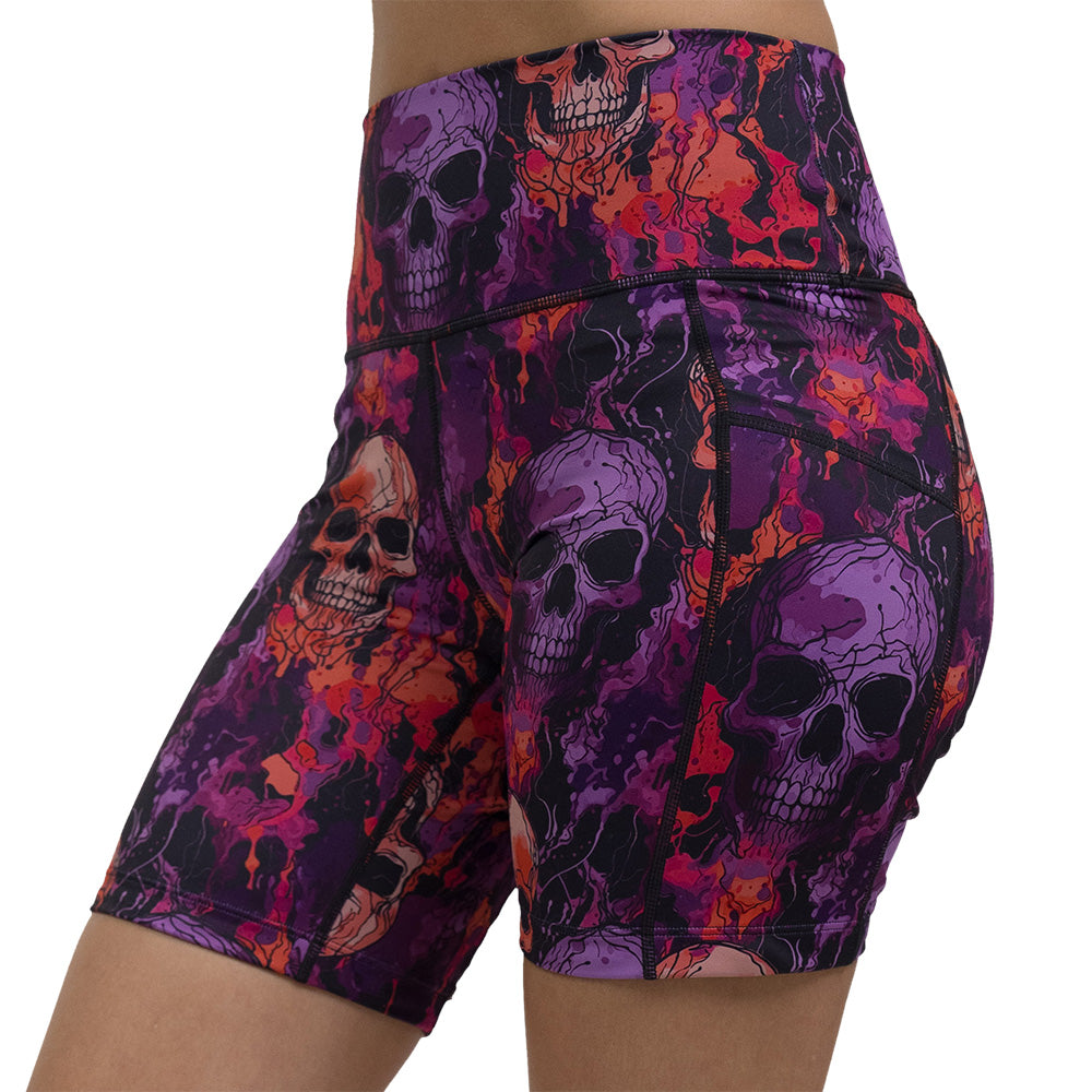 purple and orange skull patterned shorts