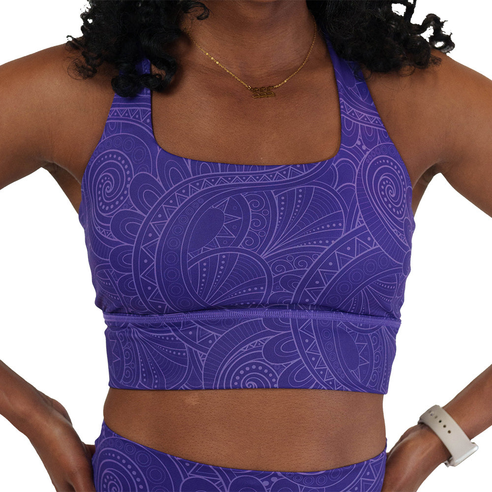 purple sports bra with a spiral design