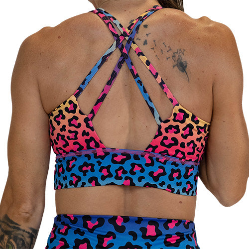 back view of the rainbow leopard sports bra
