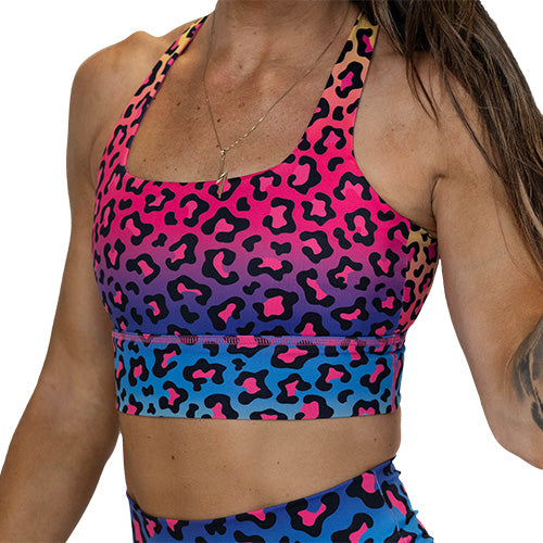 front view of the rainbow leopard sports bra