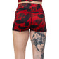back of red and black raven and skull print shorts