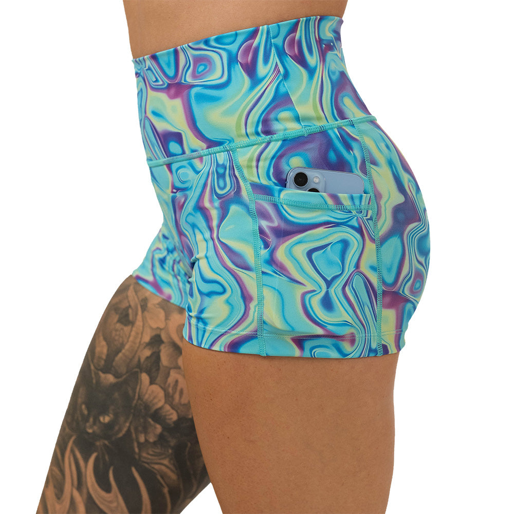 Multicolored swirl patterned shorts on a white background