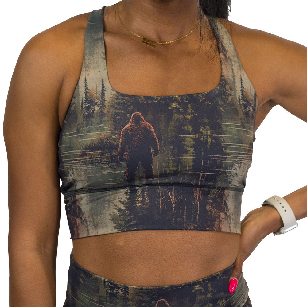 bra with a forest design and a bigfoot graphic on it