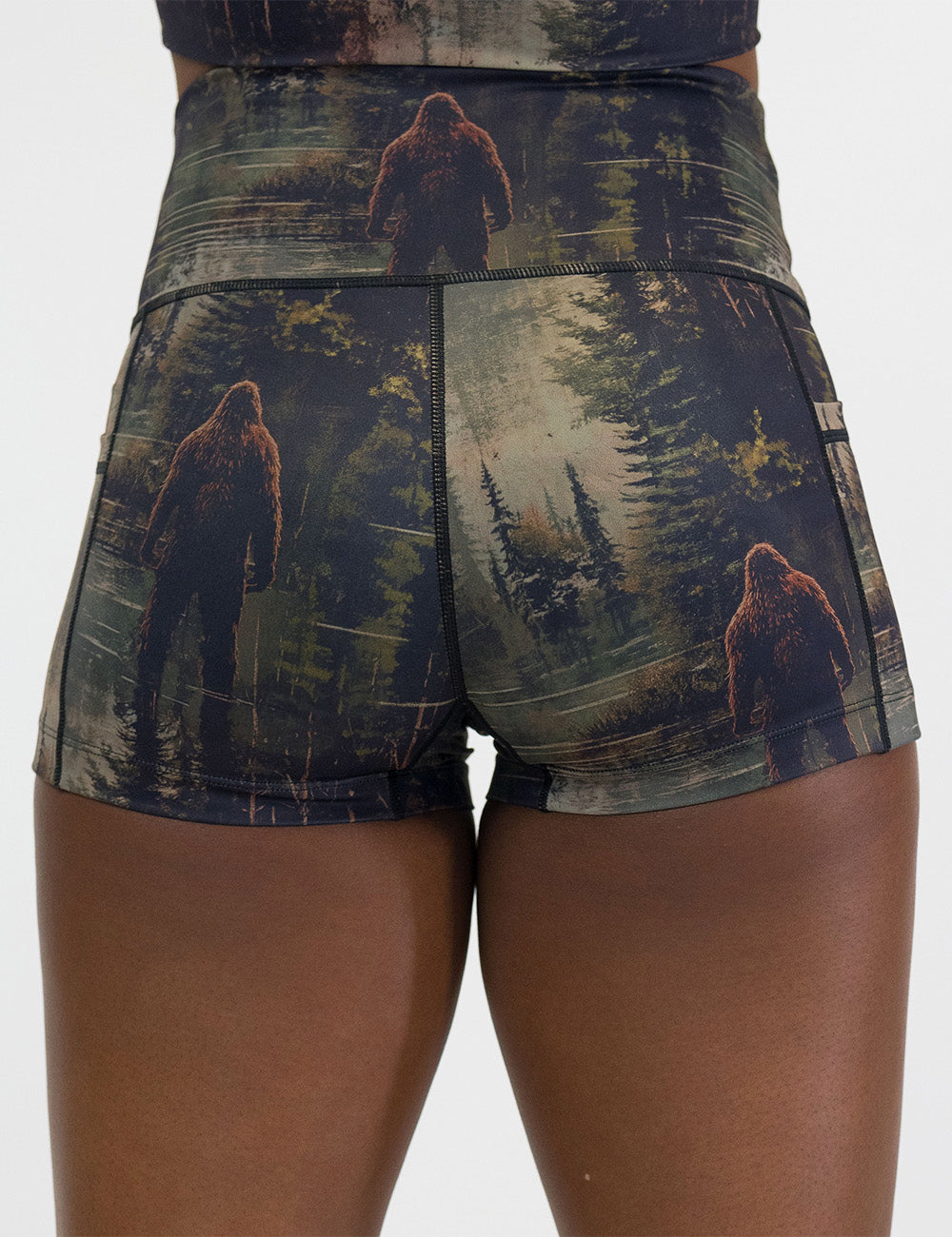 back of the 2.5 inch bigfoot in a forest shorts against a white background