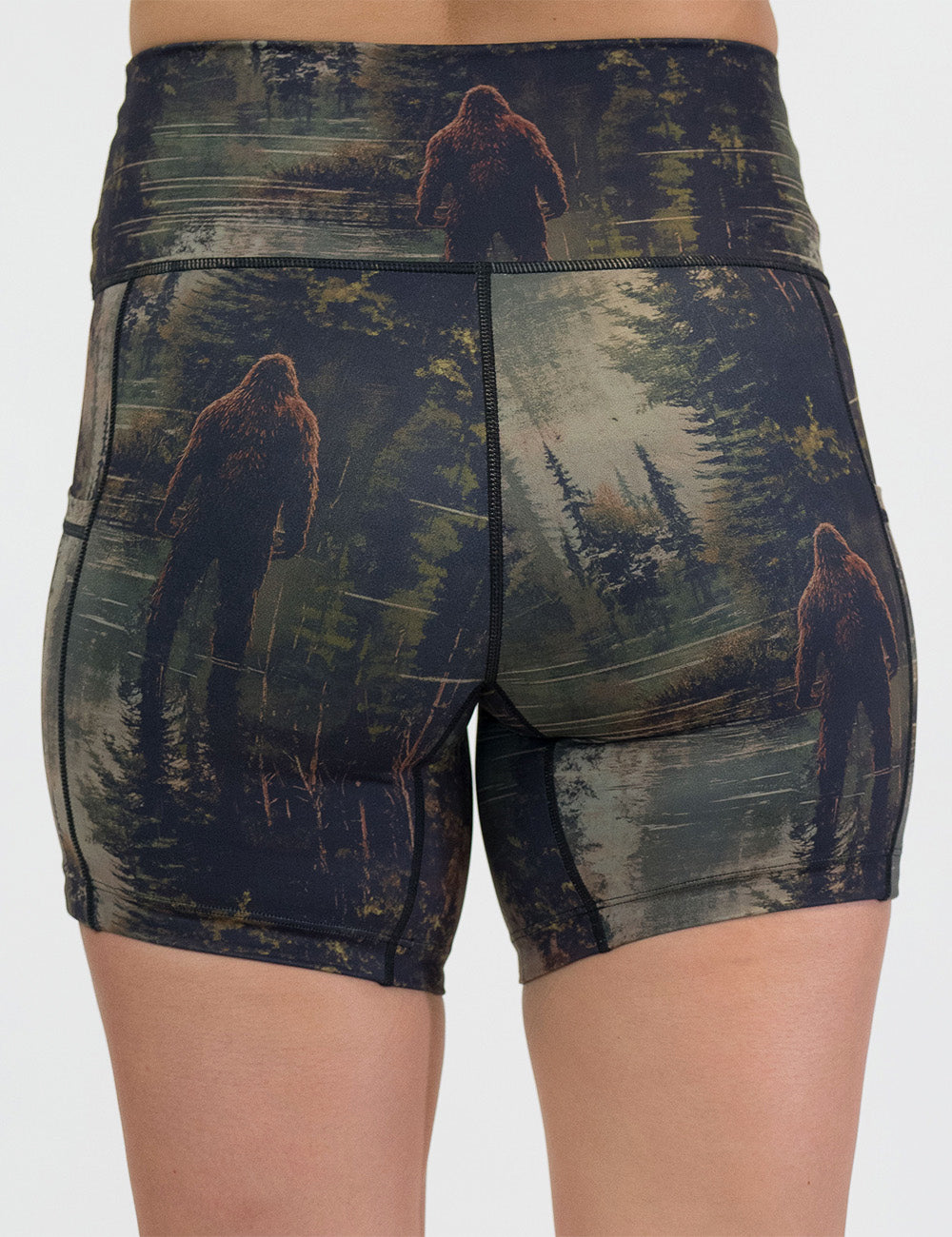 back of the 5 inch bigfoot in a forest shorts against a white background
