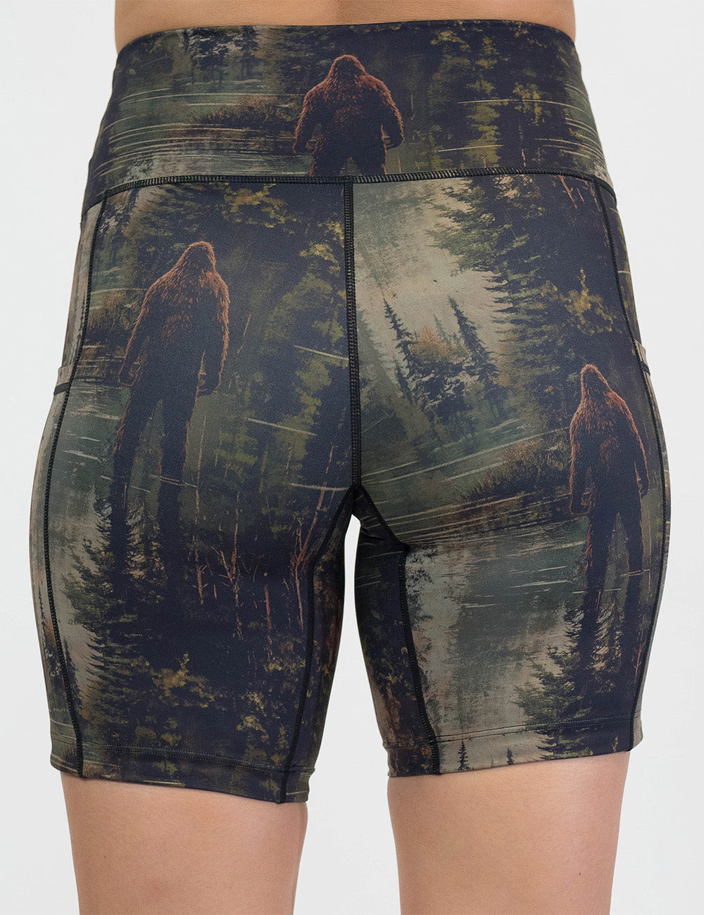 back of the bigfoot in a forest 7 inch shorts against a white background
