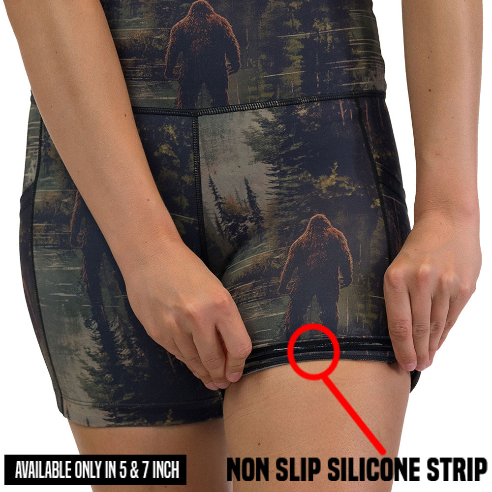 non slip strip on the shorts with a forest design and a bigfoot graphic on it