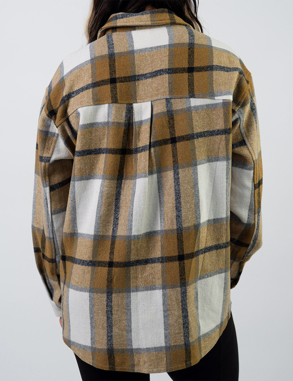 back of the khaki plaid shacket against a white background