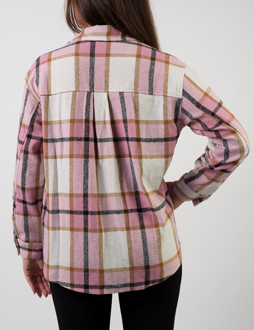 back of the pink, black, white, and brown plaid shacket against a white background