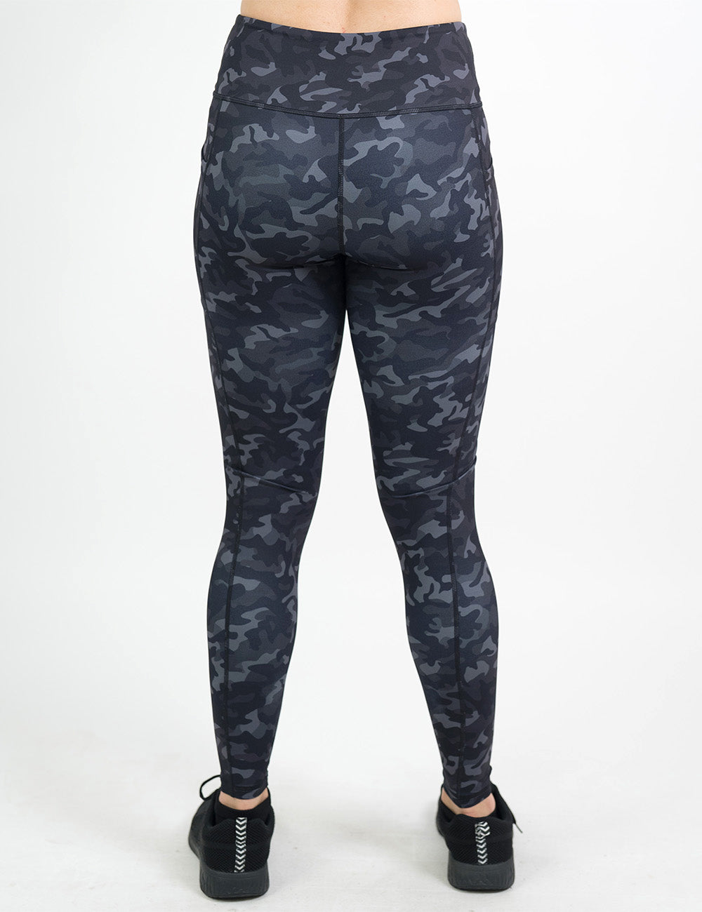 back of the full length black camo print leggings against a white background