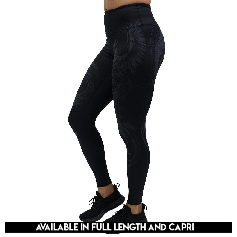 Black leggings with a phoenix design on them