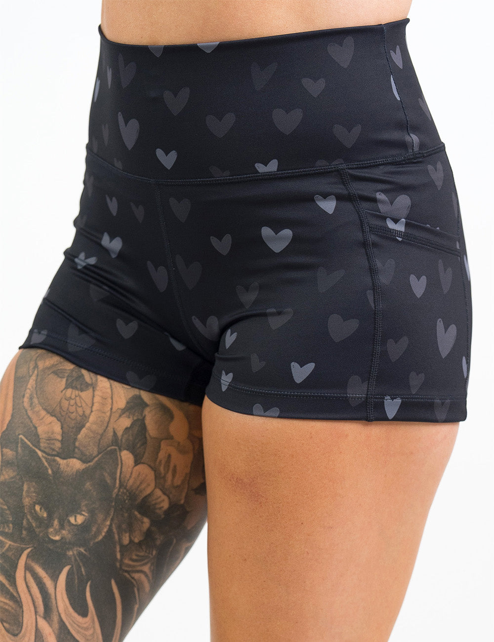 front of the 2.5 inch black shorts with light and dark grey hearts against a white background